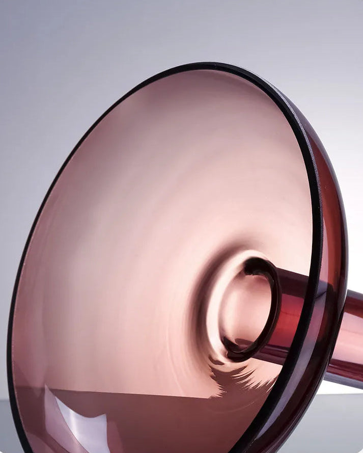 Close-up of a rose gold object with a blurred background