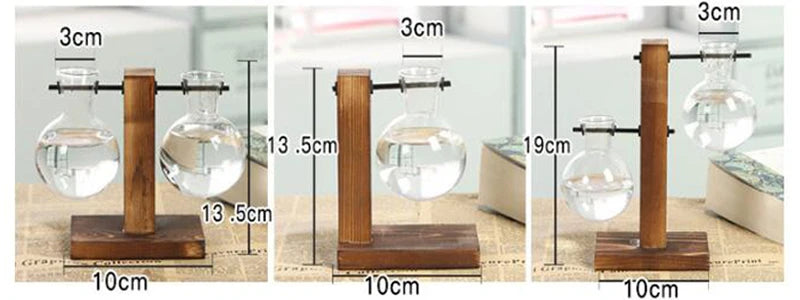 Three views of a glass ball weight with wooden stand, showing measurements.